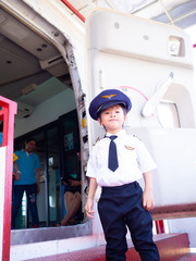 Pilot girl driving a plane on Airplane in Childrens