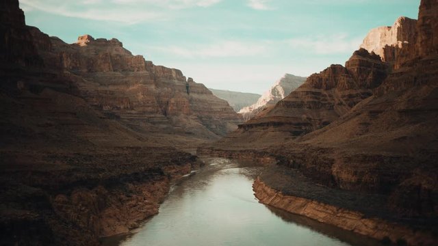 Grand Canyon in Arizona, power of nature, river between cliffs of canyon, travel around the United States