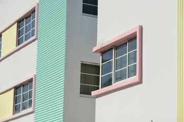 Fototapeta na wymiar South Beach buildings facades, architectural detail. Pastel colors, geometric patterns and corrugated texture wall.