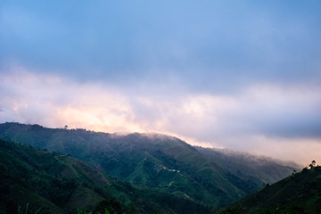 view of mountains and clouds