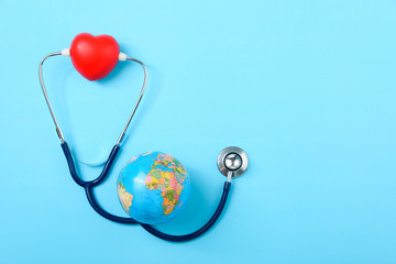 World health day concept, Stethoscope, globe and red heart