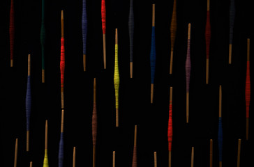 Background of multicolor silk Wrapped on bamboo sticks