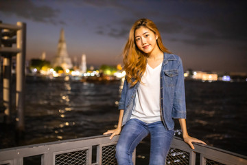The solo Asian female traveler.Bangkok, Thailand tourist  , Young woman traveler smiling happy vacation concept.