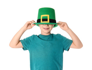 Funny little boy on white background. St. Patrick's Day celebration