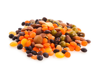 Different types of lentils isolated on a white background.