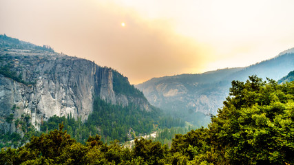 Smoke covering the Sierra Nevada Mountains and the Merced River Valley due to the 2019 Briceburg Fire, a large Forest Fire outside Yosemite National Park in California, United States