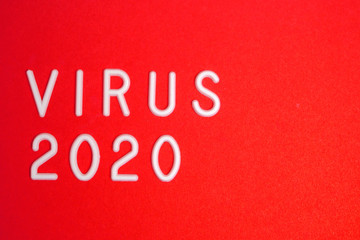 Virus is written in white letters on a red background.