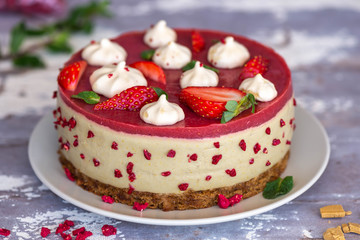 Vegan raw cake made of strawberry and banana cream