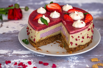 Vegan raw cake made of strawberry and banana cream