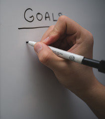 Writing Goals on a Whiteboard for Inspiration and Planning