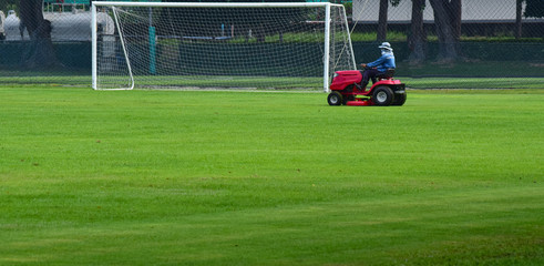Small mower that keeps mowing football field 