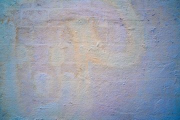 An empty space pastel cement wall with blue green yellow color