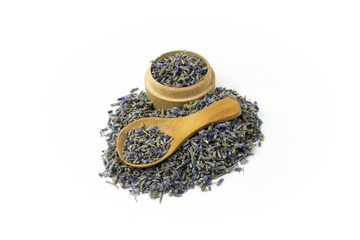 Lavender Herb Bud Flower tea Heap pile surface in wooden bow isolated on white background