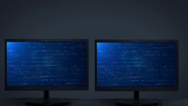 Two monitor displaying security hacking code data