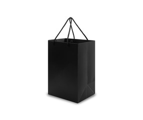 Black paper bag with handles in side view isolated on white background with clipping path.