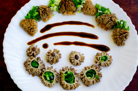 Mushroom Salad With Green Onions And Soy Sauce On A White Plate. Morel Mushroom