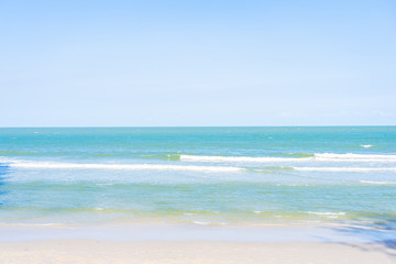 Beautiful tropical beach sea ocean with white cloud and blue sky