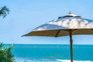 Umbrella and chair around beach sea ocean