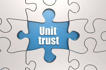 Fototapeta premium Unit trust word on jigsaw puzzle