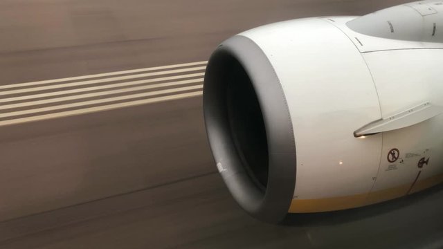 Airplane Jet Engine Close Up during Take Off and Climb Out.