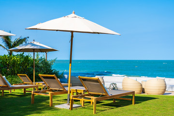 Umbrella and chair around beach sea ocean