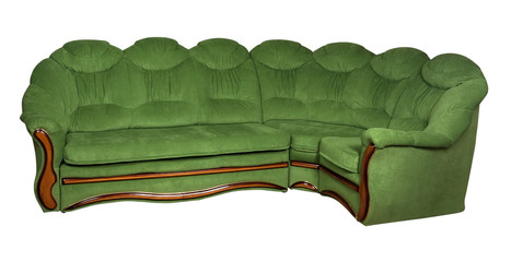 Soft corner sofa with upholstery from green plain fabric on a white background.