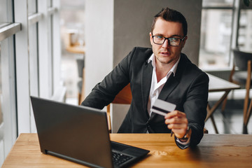 bank manager offers a credit card