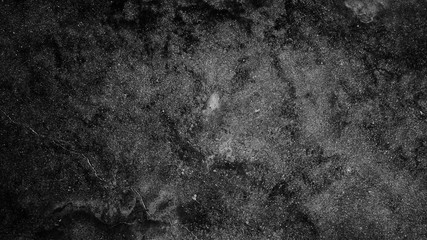Fototapeta na wymiar black cement wall background. dirty concrete stone floor