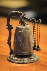 A bronze bell like decoration