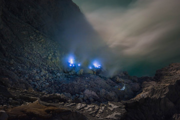 Blue fire at Kawa ijen volcano mountain