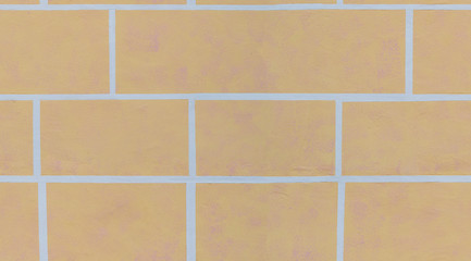 Seamless pattern with a wall of large blocks of pastel color.