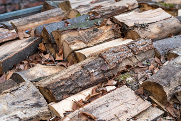 Background with lying chopped wood for kindling a stove