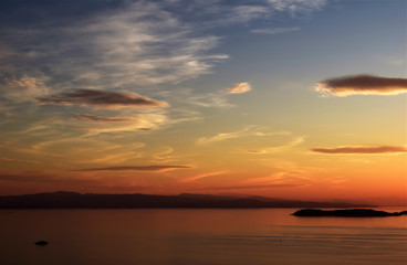 Fototapeta na wymiar Sunset , sunset on the islands of the Aegean, Greece, SporadesGreece , Mediterranean Sea , Aegean sea , Skiathos island ,Skopelos island vacation in Greece .