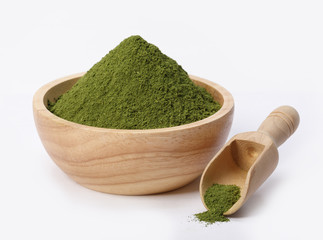 Matcha green tea powder in bowl isolated on white background, Organic product from the nature for...