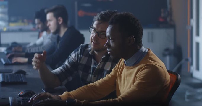 Programmers working in a common office