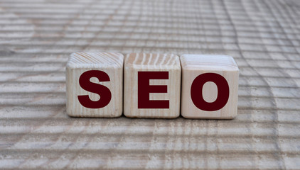 concept of the word seo on cubes on a beautiful background