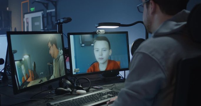 Programmer talking with a boy via a VoIP call