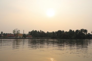 Naklejka premium sunset on the river