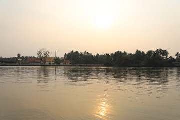 Obraz premium sunset over river