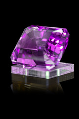 Purple diamond on a black background