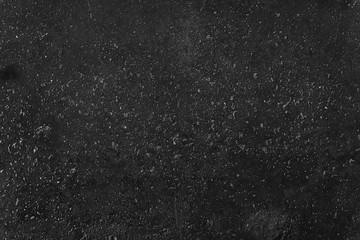 black old wall cracked concrete background / abstract black texture, vintage old background