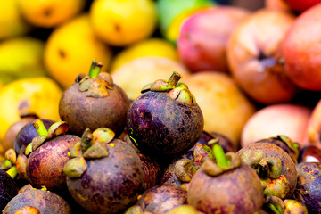 exotic fruits in Asia at the mangosteen market, magnets, beautiful, delicious fruit, different...