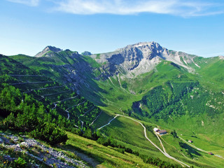 Alpine mountain peaks Spitz and Augstenberg over the Malbuntal alpine valley and in the...