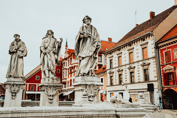 Statues of the Plague Column on the main square of Maribor, Slovenia. Europe.