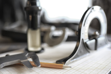 drawing tools, concept engineering project vintage / compass pencil paper education drafting