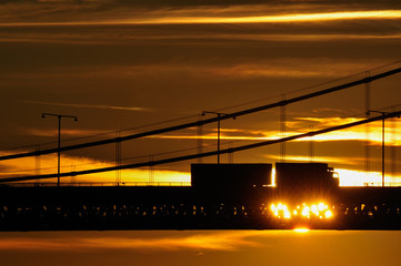 Sunset over bridge when lorry passing, Gothenburg, Sweden, Europe