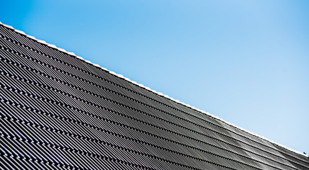  gray metal roof at sunny day © mirsad