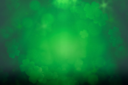 ST Patrick's day green background clover leaf bokeh lights defocused for ST Patrick's day celebration design background