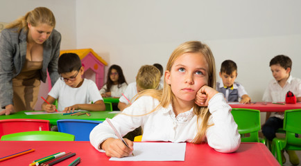 Portrait of bored schoolgirl