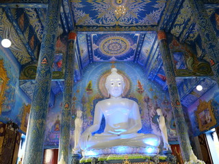 Obraz premium 2019: White Buddha in Blue Temple (Wat Rong Seur Ten), Chiang Rai. It is one of the most beautiful temples in Thailand and attract many tourists to visit the place.